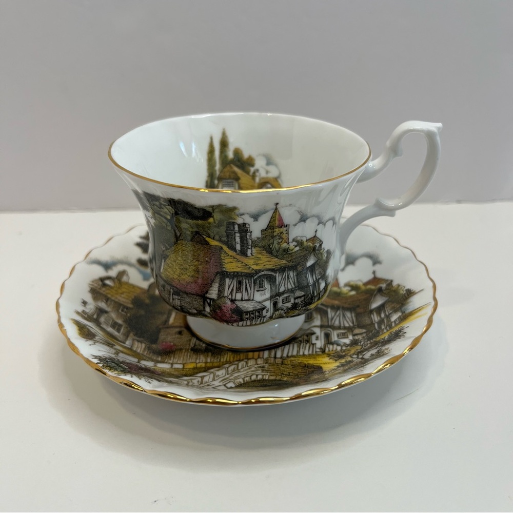 ROYAL ALBERT footed tea cup and saucer bone china England cottage print